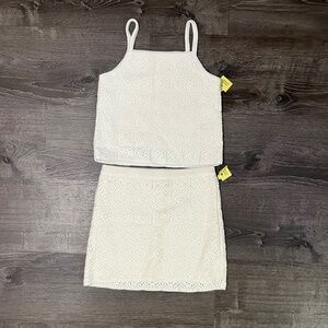 White tank top with a matching skirt